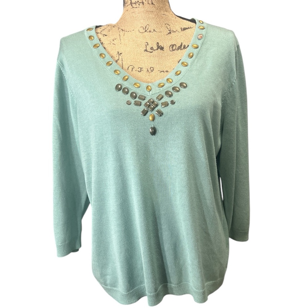 RQT EC  light blue/green sweater with embellishments around the V-neck. Size 1X